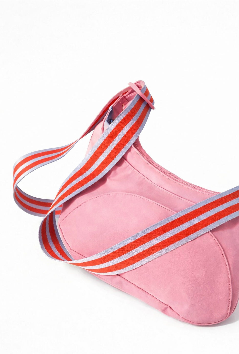 Pink bag  with striped straps on a white background