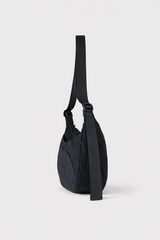 Side angle of Citymouse® Park Bag in Onyx black
