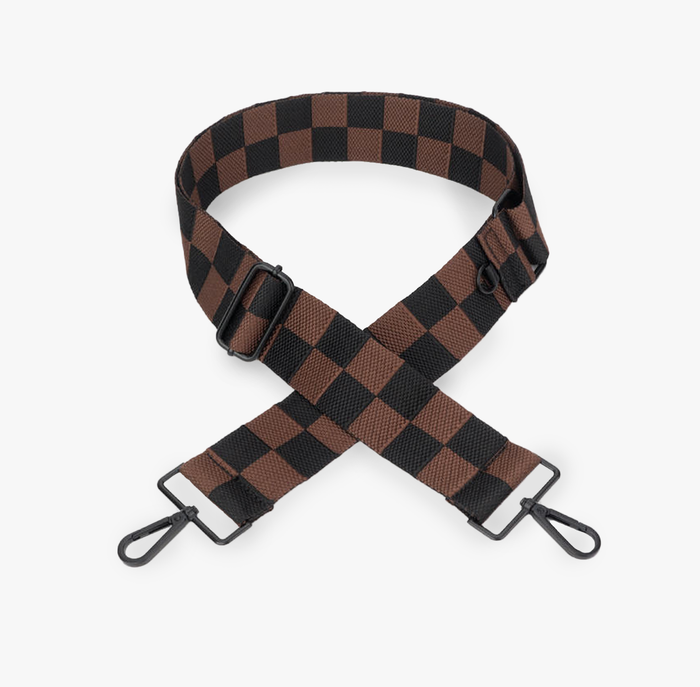 A black and brown checkerboard pattern strap with matte metal hardware