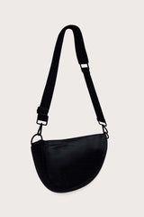 image of the Black Citymouse NY Classic Crossbody Diaper Bag with plain black strap on a light gray background