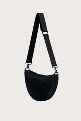 image of the Black Citymouse NY Classic Crossbody Diaper Bag with plain black strap on a light gray background