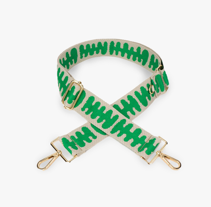 A green wavy strap with matte metal hardware