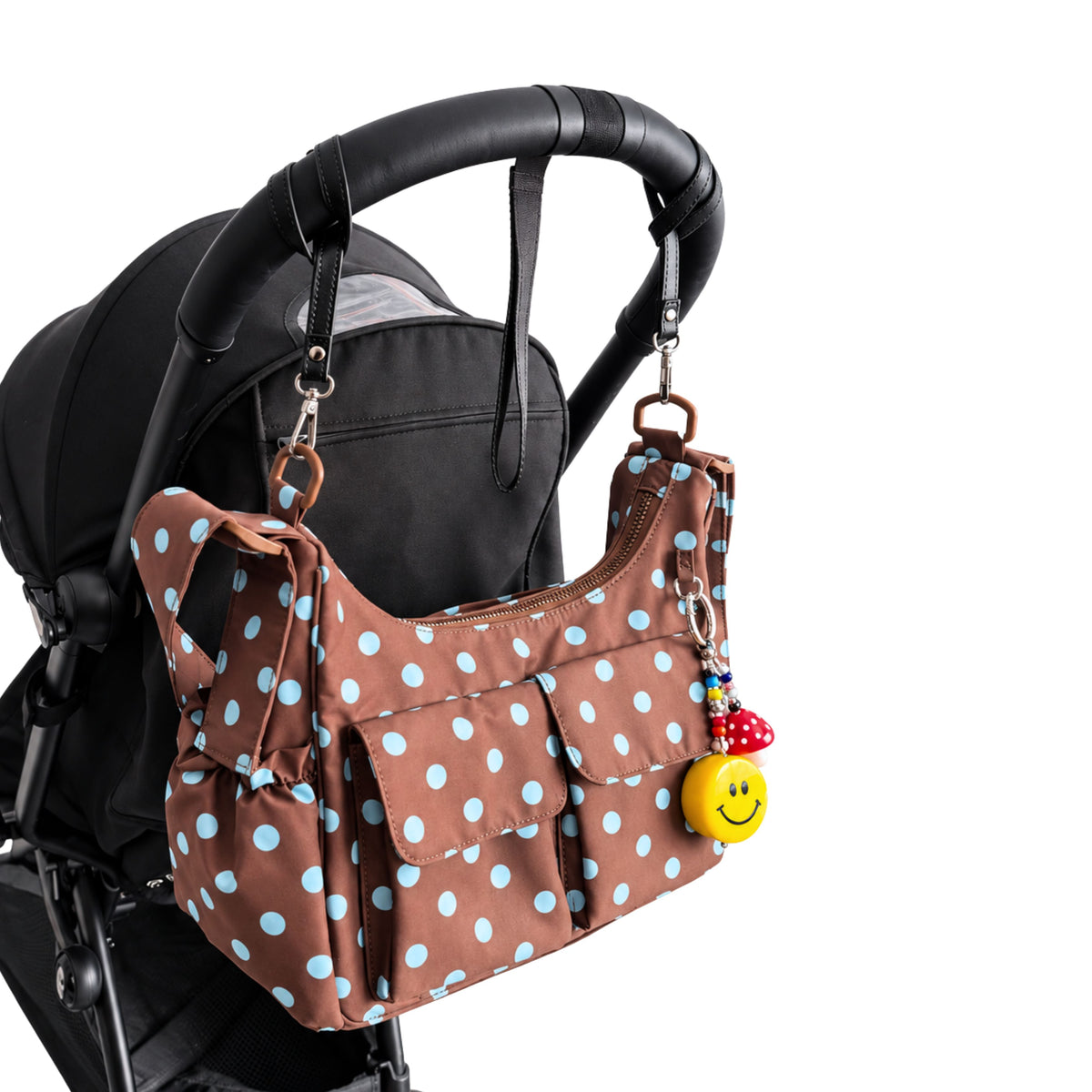 Citymouse Cargo Crossbody Diaper Bag in Siena on a stroller